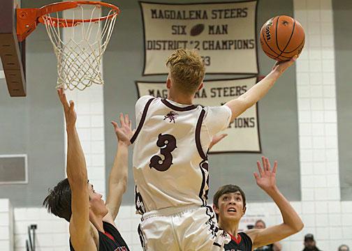 Magdalena wins 10th consecutive district basketball title