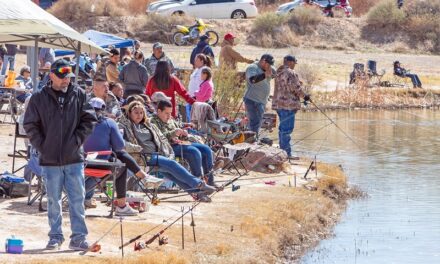 Youngsters flock to Escondida Lake for annual fishing derby